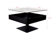 Moderne salontafel met vierkant marmeren blad en zwart onderstel, gezien vanaf de zijkant.