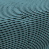 Nahaufnahme eines türkisfarbenen, gerippten Stoffes, der Teil einer Rundecke ist.