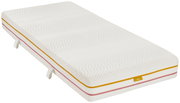Matratze 80x200 SOFT/MEDIUM in schräger Perspektive, mit strukturiertem weißen Bezug und farbigen Akzenten.
