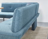 Eckbank in blauem Stoffbezug, seitliche Perspektive