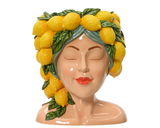 Keramik-Blumentopf in Form eines Frauenkopfes mit geschlossenen Augen, verziert mit Zitronen und Blättern als Haarschmuck, Frontalansicht