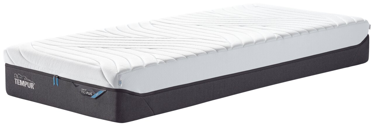 Viscomatratze 140x200 soft von schräg vorne, mit weißer Oberseite und dunklem Unterteil.