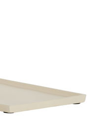 Eckige, flache Schale aus hellem Material, seitliche Perspektive