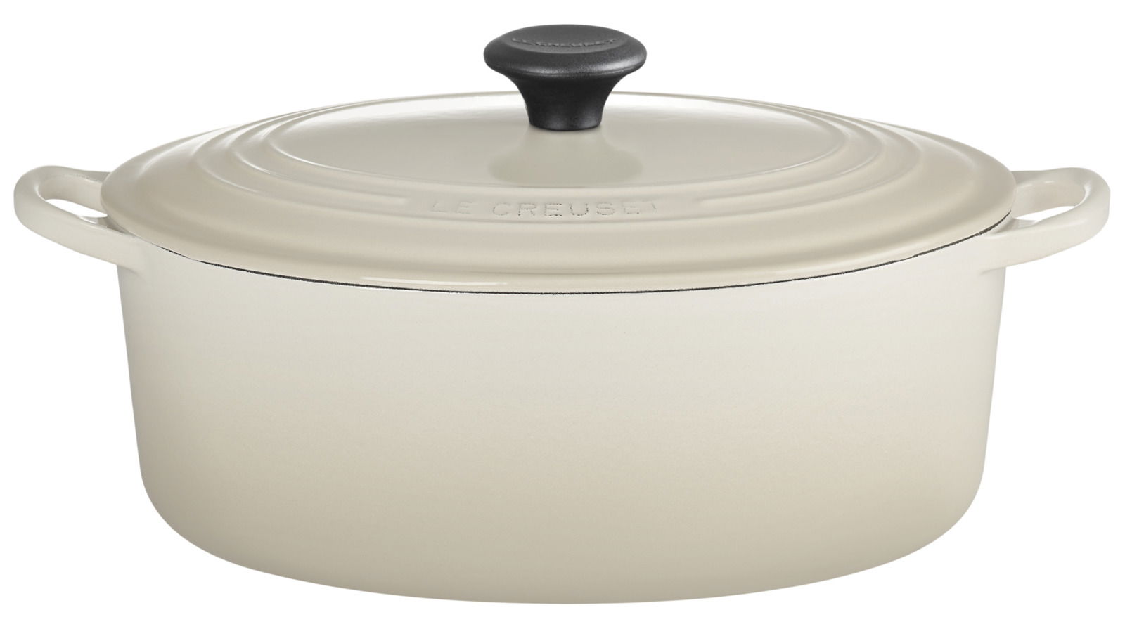LE CREUSET Bräter 31cm oval DUNE Ovaler Bräter 31cm in Cremefarbe mit Deckel und zwei Griffen, seitliche Perspektive