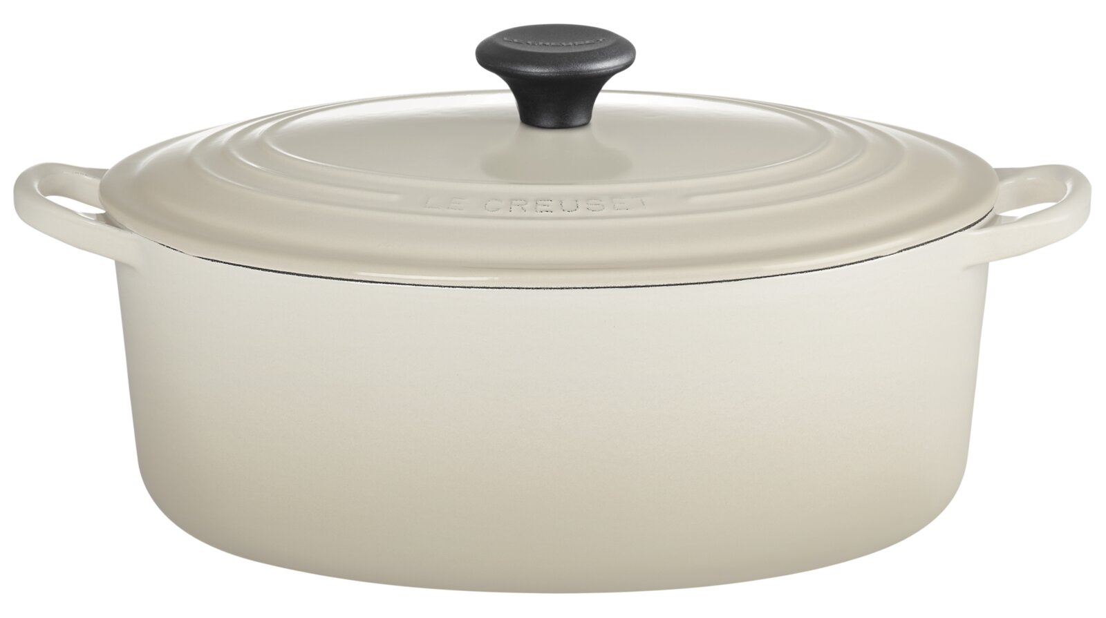LE CREUSET Bräter 31cm oval DUNE Ovaler Bräter 31cm in Cremefarbe mit Deckel und zwei Griffen, seitliche Perspektive