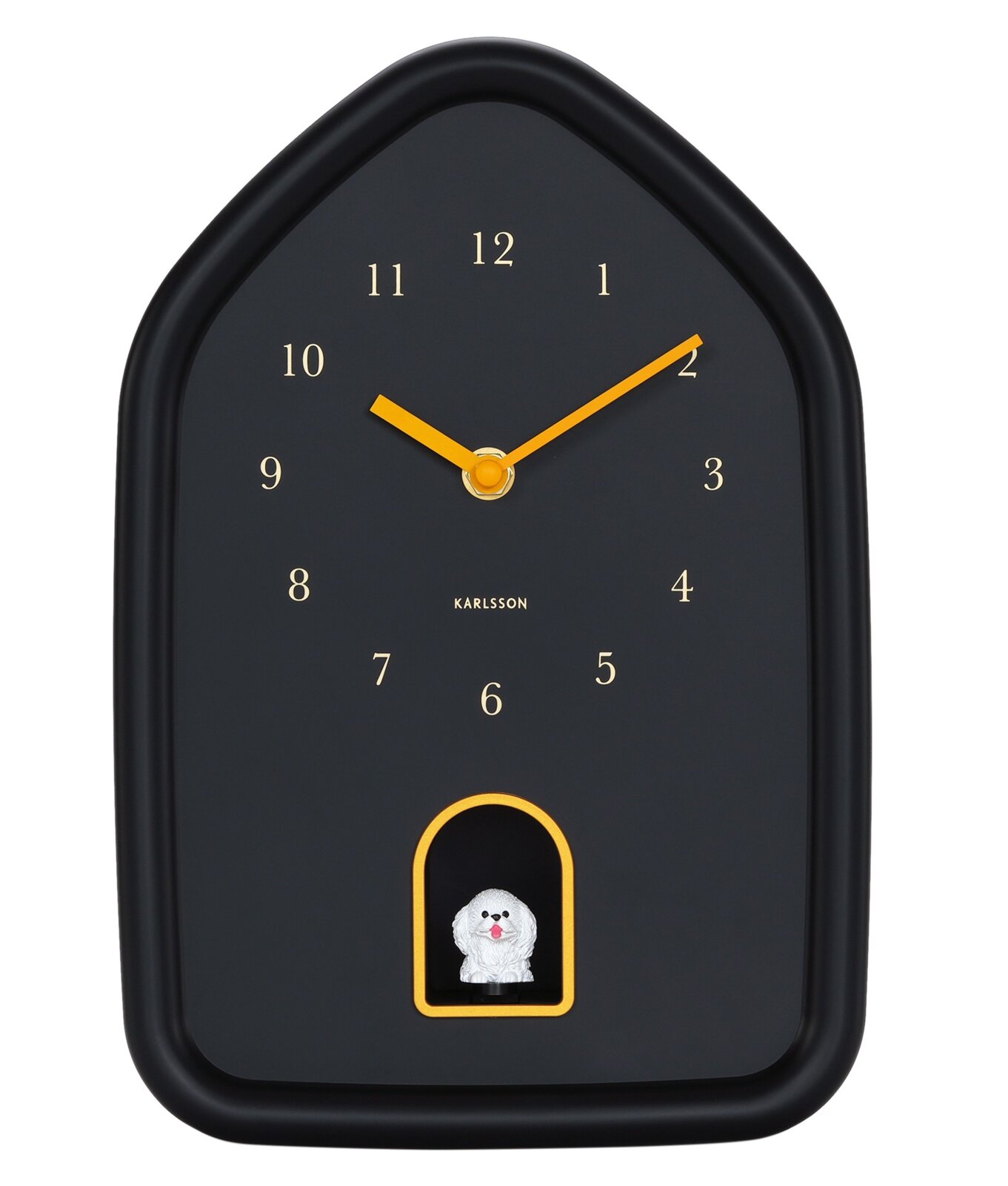 Schwarze Wanduhr in Hausform mit gelben Zeigern und einer kleinen Hundefigur in einer Aussparung unten, Frontalansicht.