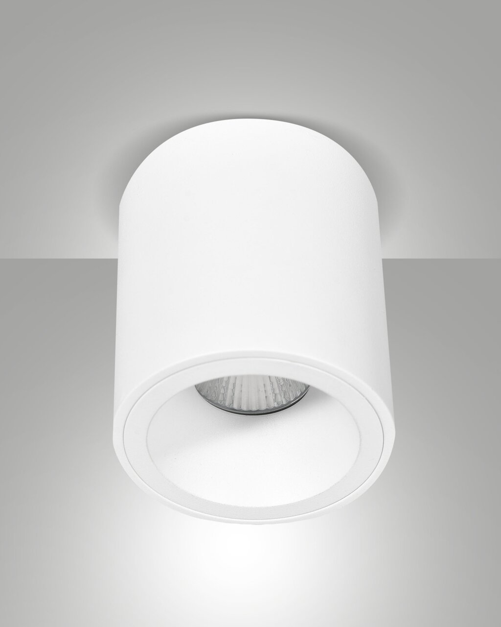 Weißer zylindrischer Aufbauspot Fabas Luce GUAMO, Deckenansicht