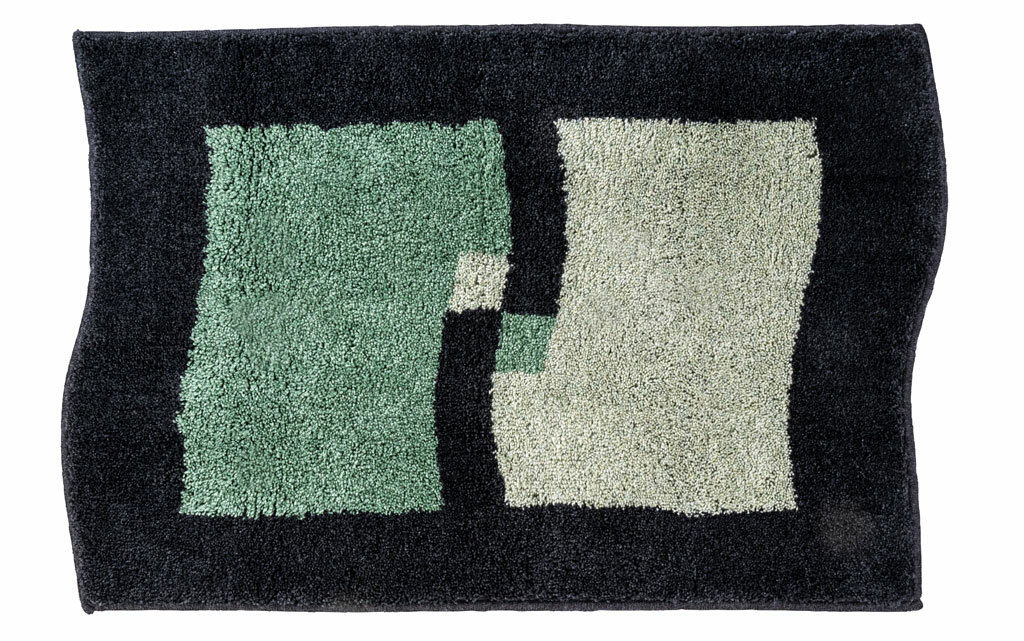 Badteppich in rechteckiger Form mit abstraktem Muster in Grün- und Beigetönen auf schwarzem Hintergrund, Draufsicht