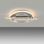 Moderne LED-Deckenleuchte in silberner Optik, von unten betrachtet, mit kreisförmigem und linearem Design.