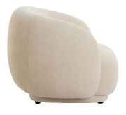 Beiger, gepolsterter Stuhl in seitlicher Ansicht mit abgerundeten Formen und texturierter Oberfläche.