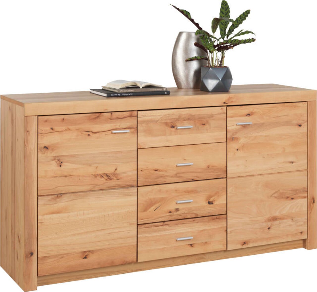 Cantus Dressoir INDIRA Holz-Sideboard mit drei Schubladen und zwei Türen, dekoriert mit einer Pflanze und einem Buch, aus frontaler Perspektive.