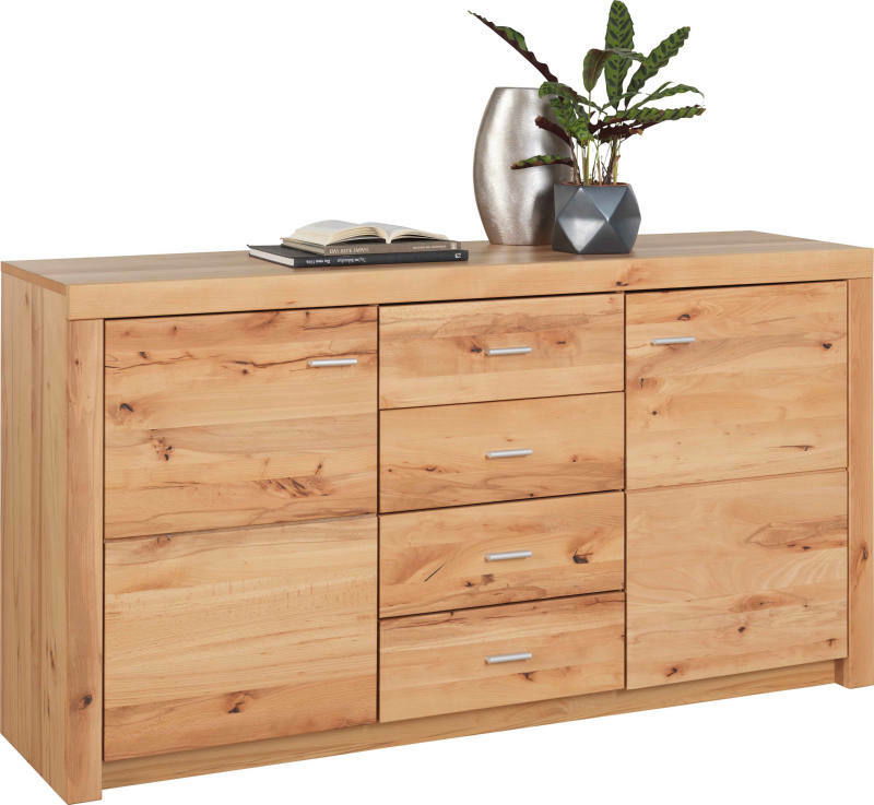 Holz-Sideboard mit drei Schubladen und zwei Türen, dekoriert mit einer Pflanze und einem Buch, aus frontaler Perspektive.