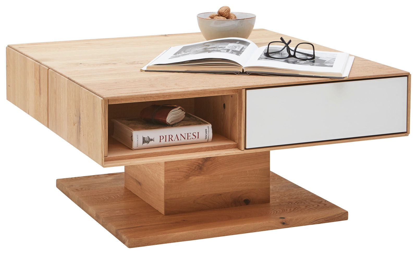 Moderner Couchtisch aus Holz mit weißer Schublade und offener Ablage, seitliche Perspektive.