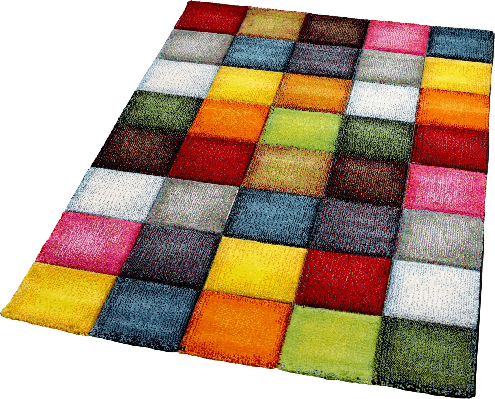 Bunter Patchwork-Teppich mit quadratischen Farbflächen in Rot, Gelb, Orange, Grün, Blau, Grau und Weiß, schräg von oben in leichter Perspektive fotografiert