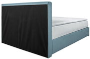 Boxspringbett TOM in hellblauem Stoffbezug, seitliche Perspektive