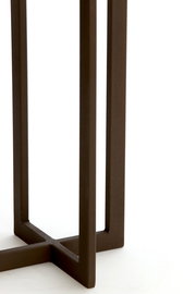 Nahaufnahme eines modernen, geometrischen Lampenfußes in dunklem Braun, seitliche Perspektive.