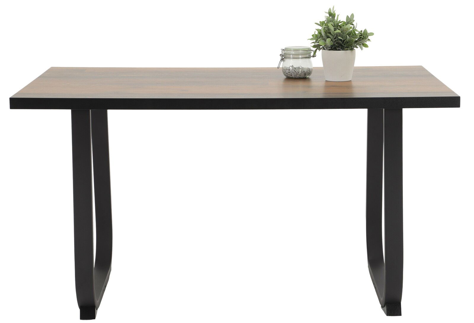 Moderner Esstisch mit Holzplatte und schwarzen Metallbeinen, seitliche Perspektive, dekoriert mit Pflanze und Glasgefäß.