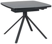 Moderner quadratischer Esstisch mit dunkler Tischplatte und vier schräg gestellten Beinen, seitliche Perspektive