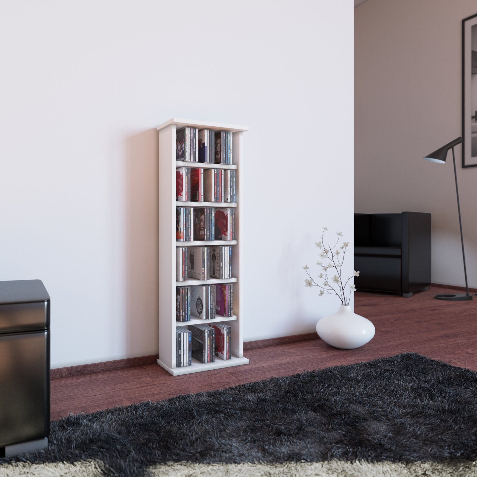 VCM CD/DVD-Turm VOSTAN Schmales weißes CD-/DVD-Regal mit mehreren Fächern, gefüllt mit CDs, in einem modernen Wohnzimmer an der Wand; Perspektive: frontale leicht seitliche Ansicht auf Augenhöhe