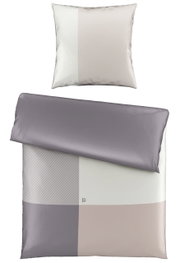 Omkeerbaar beddengoedset in zachte pasteltinten met geometrisch patroon, bovenaanzicht