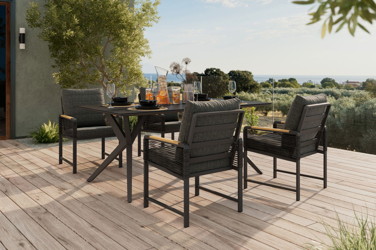 Ambia Garden Tuinstoel CALIDA Moderner Gartenstuhl auf einer Terrasse mit Blick auf die Landschaft, umgeben von einem stilvollen Esstisch-Set.