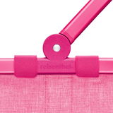 Nahaufnahme des pinken Rahmens eines Carrybag mit sichtbarem Griffgelenk, von vorne betrachtet.