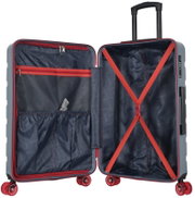 Open hardcase rolkoffer met donkerblauwe voering, rood ritsvak en kruisbanden, zicht op de binnenkant van voren