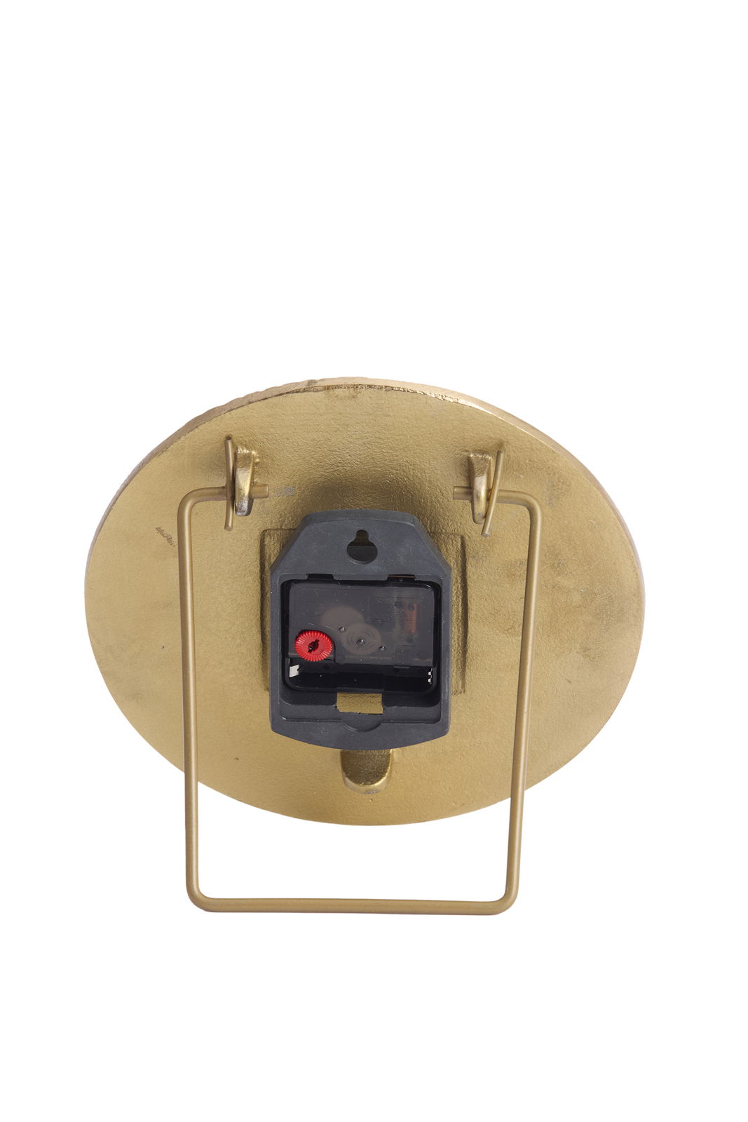 Rückansicht einer goldenen Uhr mit Ständer und Batteriefach