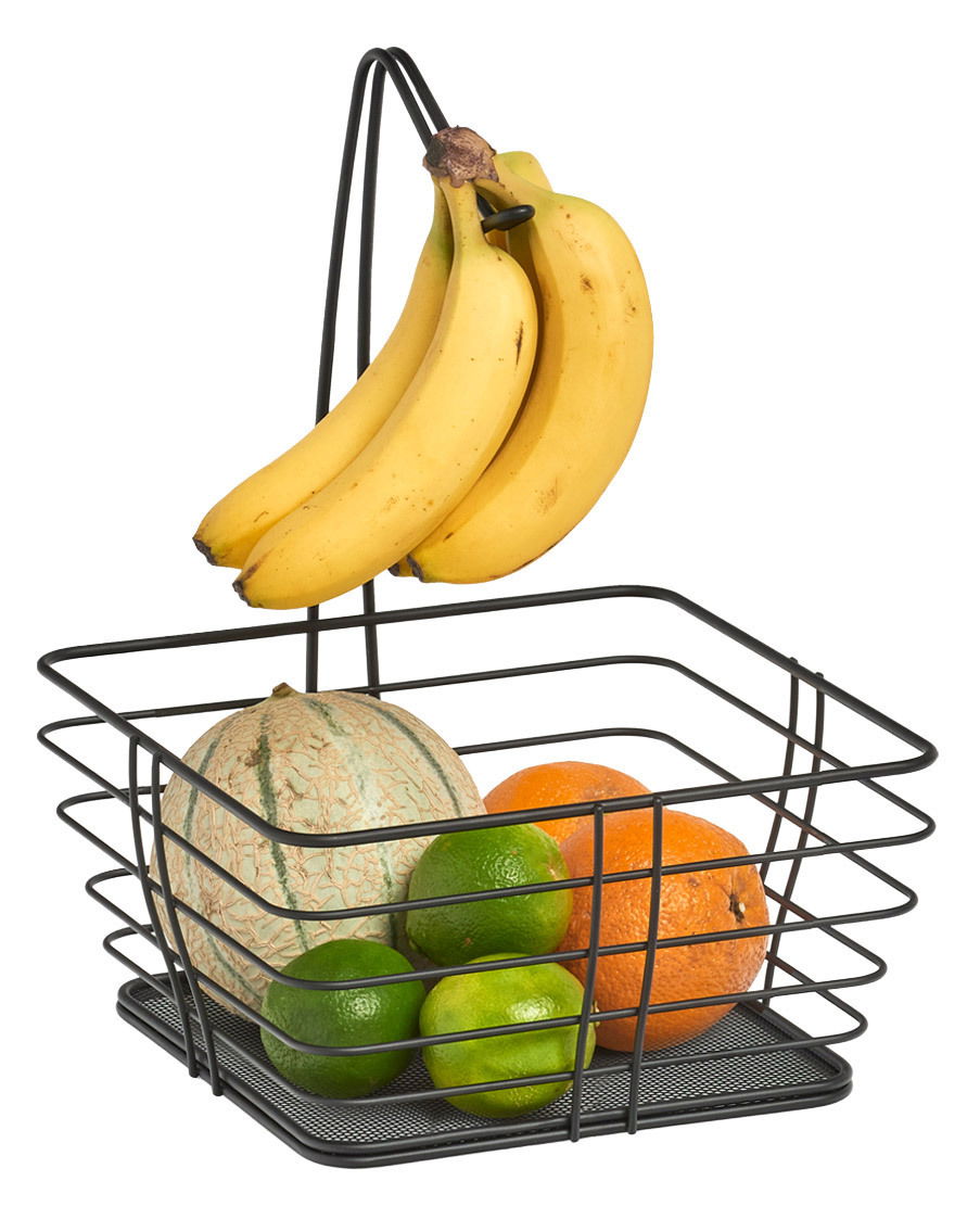 Obstkorb aus Metall mit Bananenhalter, gefüllt mit Melone, Orangen und Limetten, seitliche Perspektive