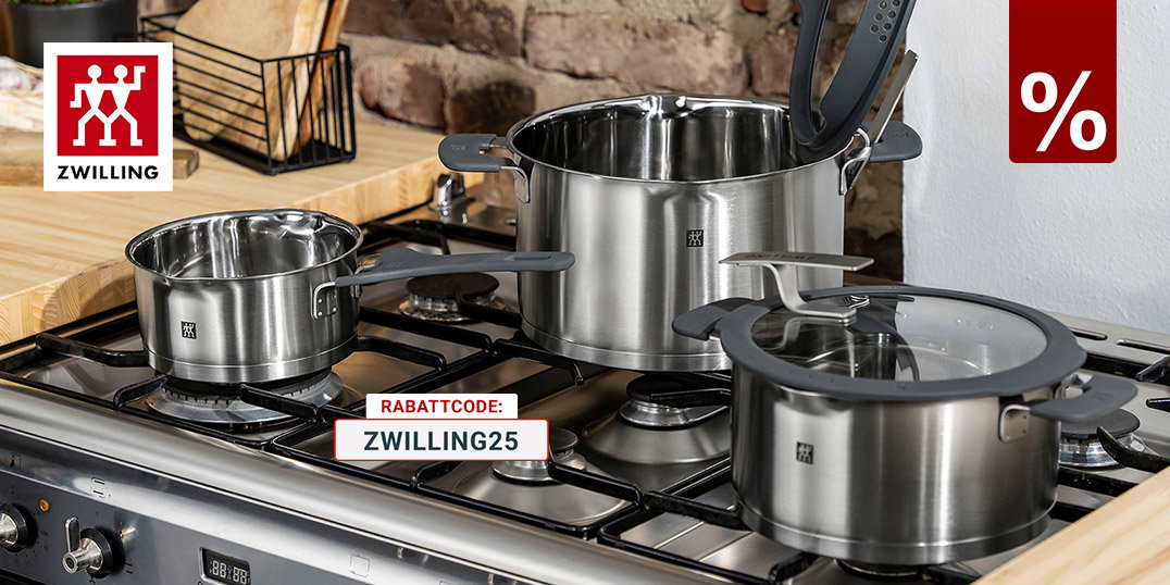 Zwilling Edelstahl Kochtopf-Set auf Gasherd in moderner Küche