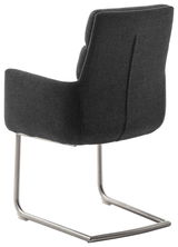 Rückansicht eines modernen Freischwinger-Sessels mit dunkelgrauem Stoffbezug und Metallgestell.