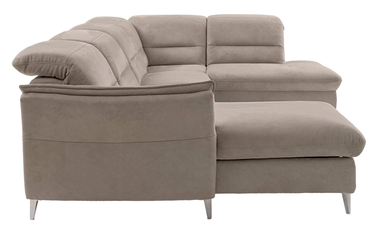 Beige Polsterrundecke in L-Form, seitliche Perspektive