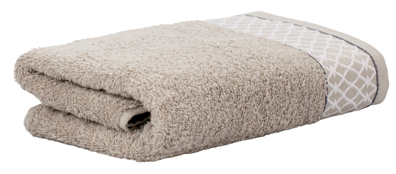 Beige handdoek met oosters patroon, aan de zijkant gevouwen.