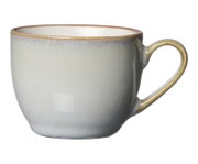 Espressokopje van 90 ml van keramiek, gezien vanaf de zijkant, met een elegant kleurverloop van beige naar bruin en een gebogen oor.