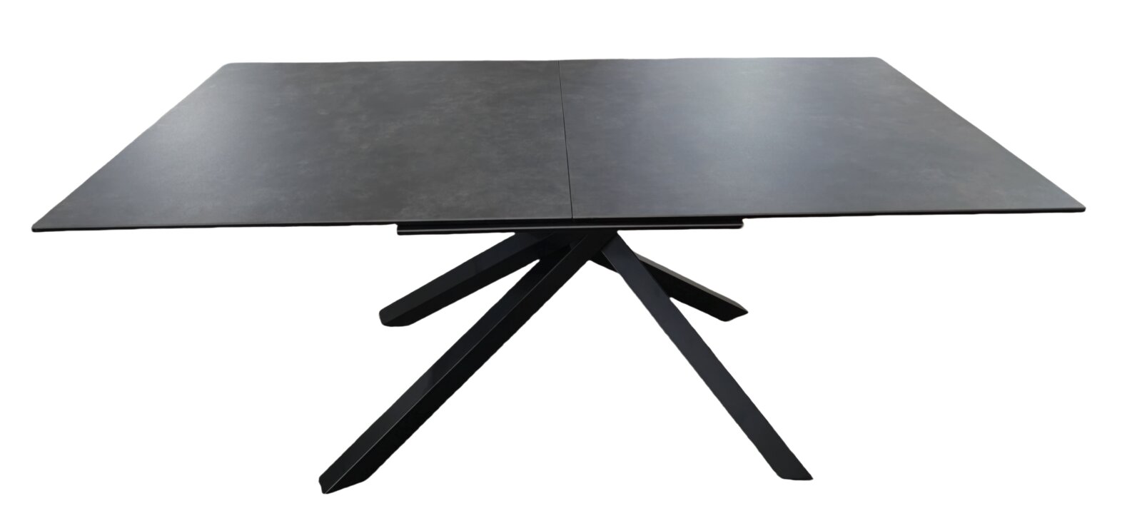Moderner Esstisch mit dunkler Tischplatte und einzigartigem, gekreuztem Tischgestell, frontal betrachtet.