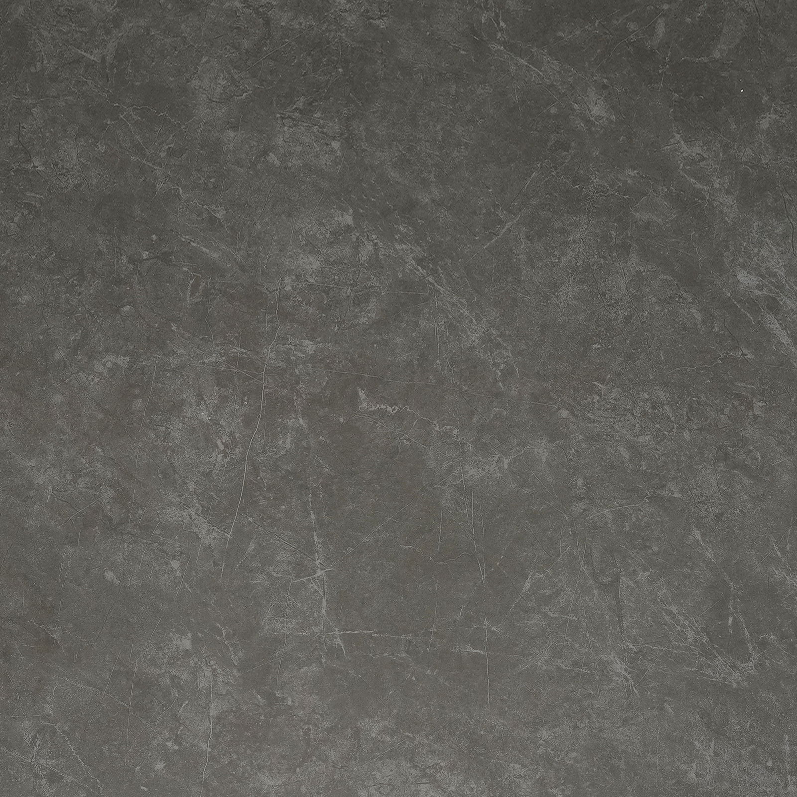 Draufsicht auf eine dunkle, steinartige Tischoberfläche mit natürlicher Textur.