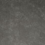 Draufsicht auf eine dunkle, steinartige Tischoberfläche mit natürlicher Textur.