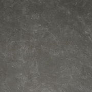 Draufsicht auf eine dunkle, steinartige Tischoberfläche mit natürlicher Textur.