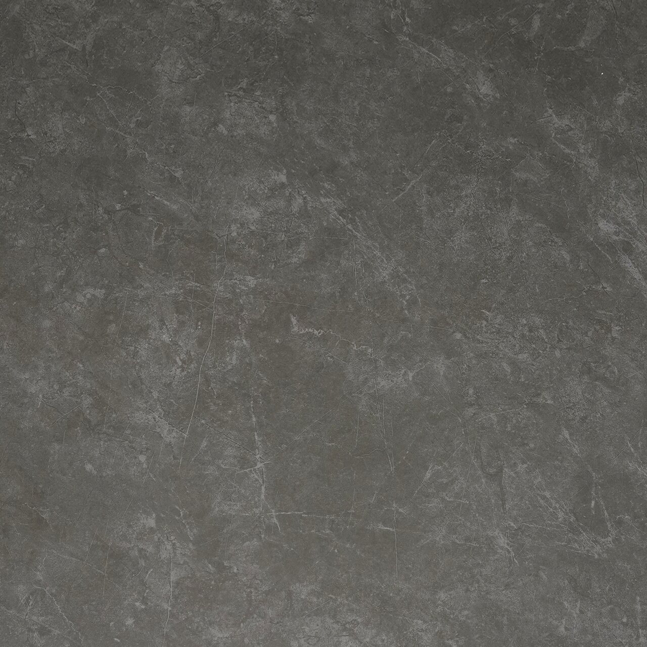 Draufsicht auf eine dunkle, steinartige Tischoberfläche mit natürlicher Textur.