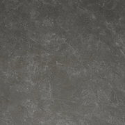 Draufsicht auf eine dunkle, steinartige Tischoberfläche mit natürlicher Textur.