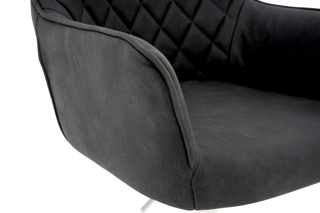 XORA Drehstuhl MARTHA Nahaufnahme eines grauen Drehstuhls mit gestepptem Muster auf der Rückenlehne, seitliche Perspektive.