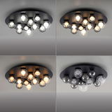 LED-Deckenleuchte mit mehreren runden Glaskugeln, von unten betrachtet, in verschiedenen Lichtstimmungen.