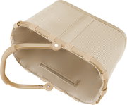 Beige, gerippte Aufbewahrungstasche mit Reißverschluss und klappbarem Metallrahmen, schräg von oben in Seitenansicht fotografiert.