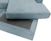 Nahaufnahme einer blauen Rundecke mit gestreiftem Stoffbezug, von oben betrachtet.