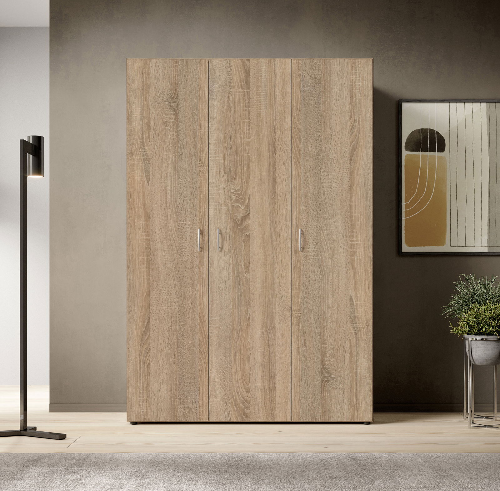 Drehtürenschrank 3-türig in Holzoptik, frontal fotografiert, in einem modernen Raum mit Lampe und Kunstwerk an der Wand.