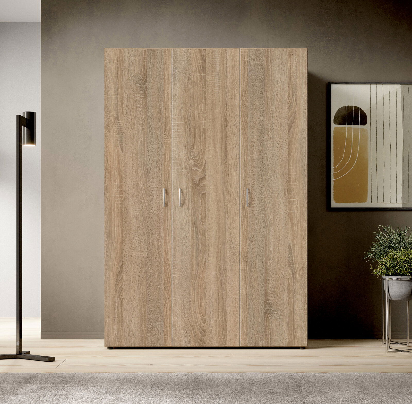Drehtürenschrank 3-türig in Holzoptik, frontal fotografiert, in einem modernen Raum mit Lampe und Kunstwerk an der Wand.