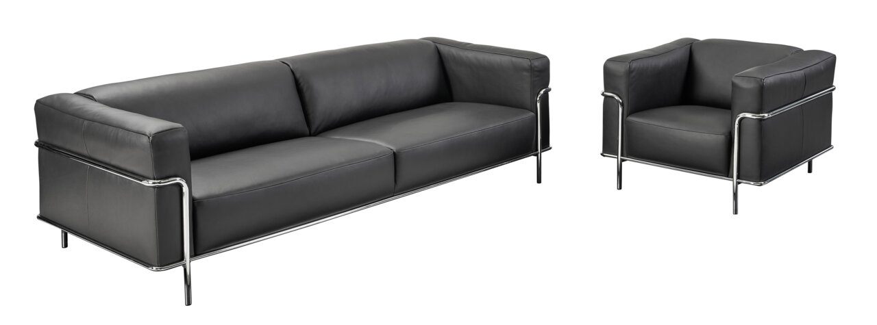 Zwarte leren bank en fauteuil met chromen onderstel, zijaanzicht