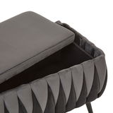 Graue Hockerbank mit aufklappbarem Sitzpolster, seitliche Perspektive