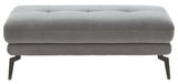 Grauer XXL-Hocker mit gepolsterter Sitzfläche und schwarzen Metallbeinen, Frontalansicht.