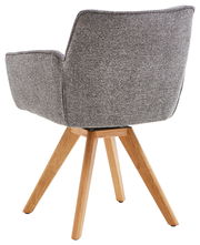 Rückansicht eines grauen Armlehnstuhls mit Holzbeinen